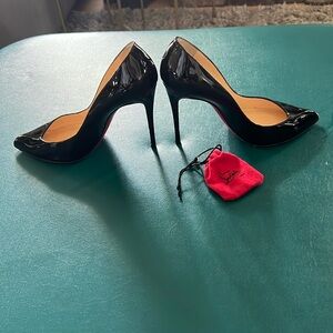 CHRISTIAN LOUBOUTIN HEELS. Never worn